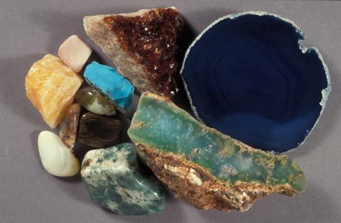 A selection of brightly coloured rocks, minerals, ores and fossils.
