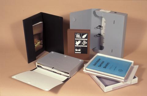 A range of examples of different storage boxes for paper material.